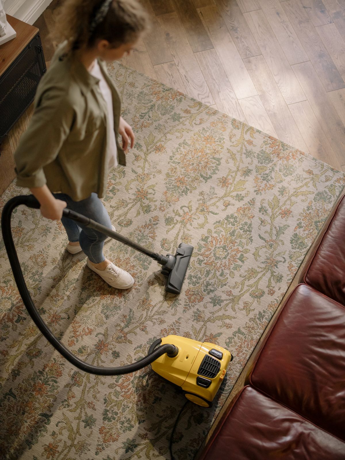 Vacuuming every corner of an empty home